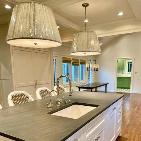 custom pendant lamps hanging over kitchen counter